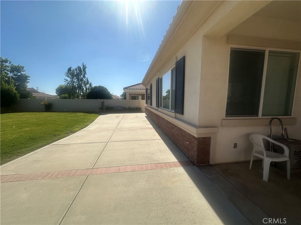 1185 Lantana Road Beaumont, CA 92223 - Photo 3 of 36 a view of balcony with hardwood floor and bench