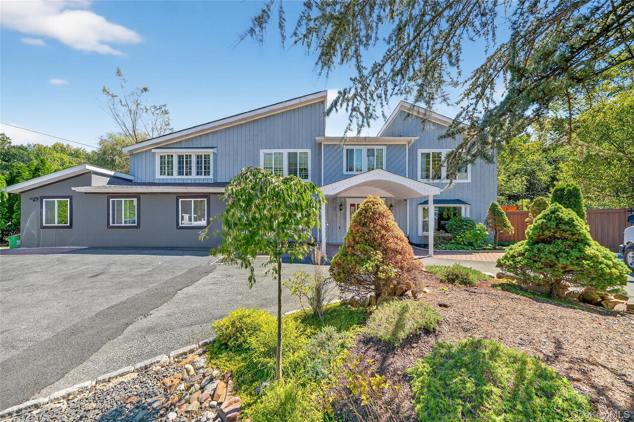 View of front of property featuring driveway