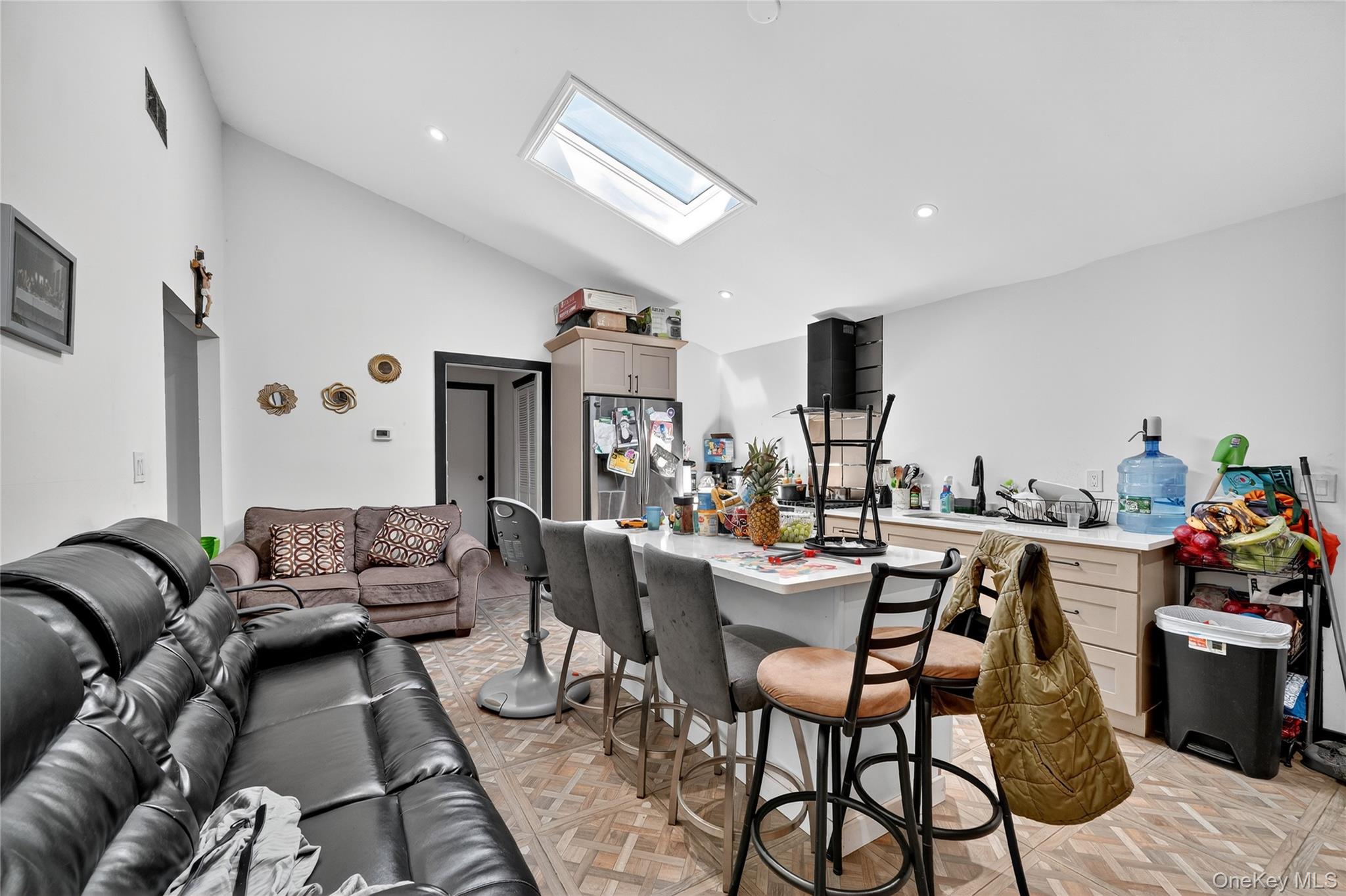 306 South Pascack Road Nanuet, NY 10954 - Photo 22 of 48 Living area featuring a skylight, lofted ceiling, and recessed lighting