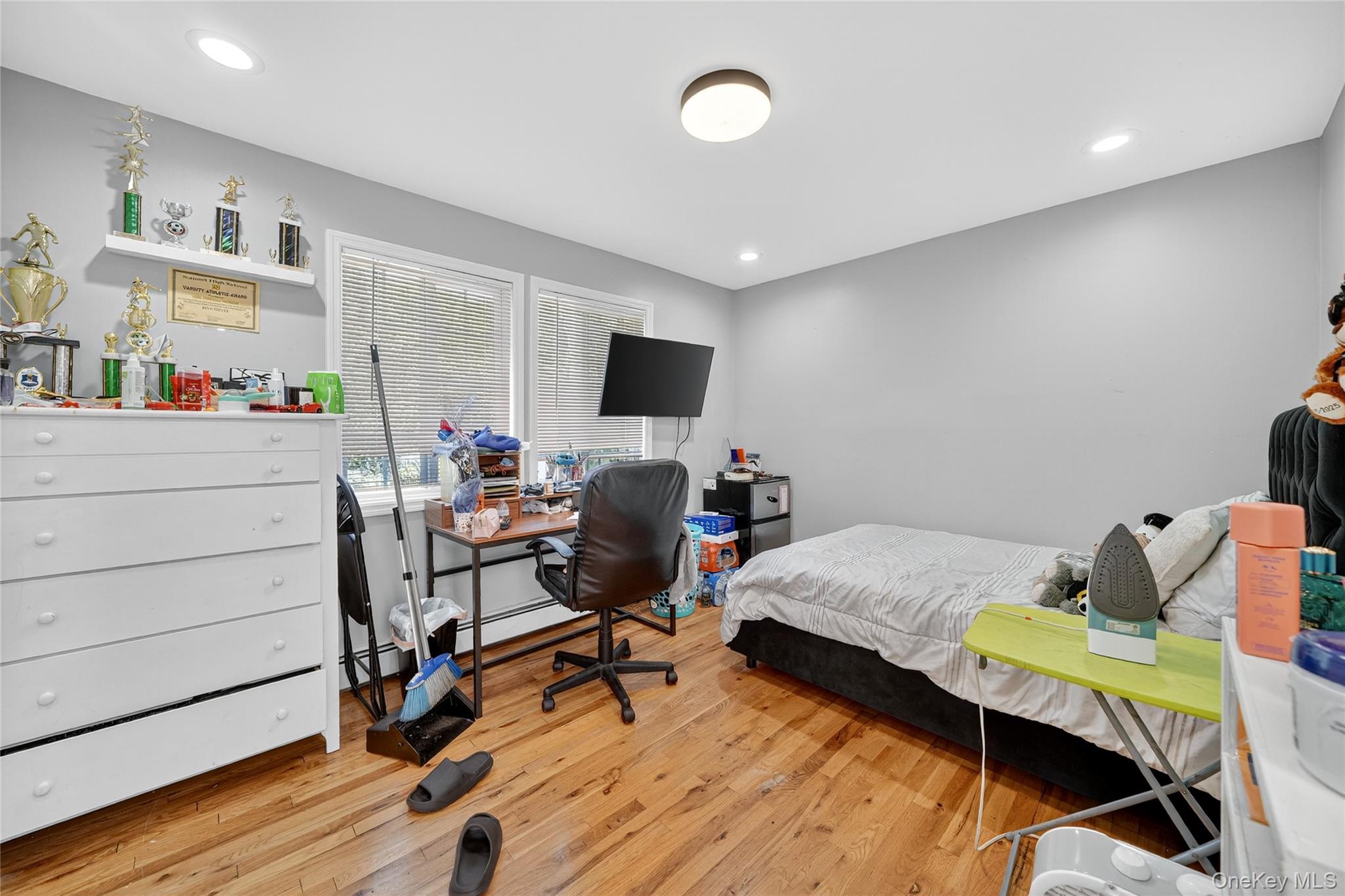 306 South Pascack Road Nanuet, NY 10954 - Photo 26 of 48 Bedroom with an office area, recessed lighting, light wood-style floors, and a baseboard radiator