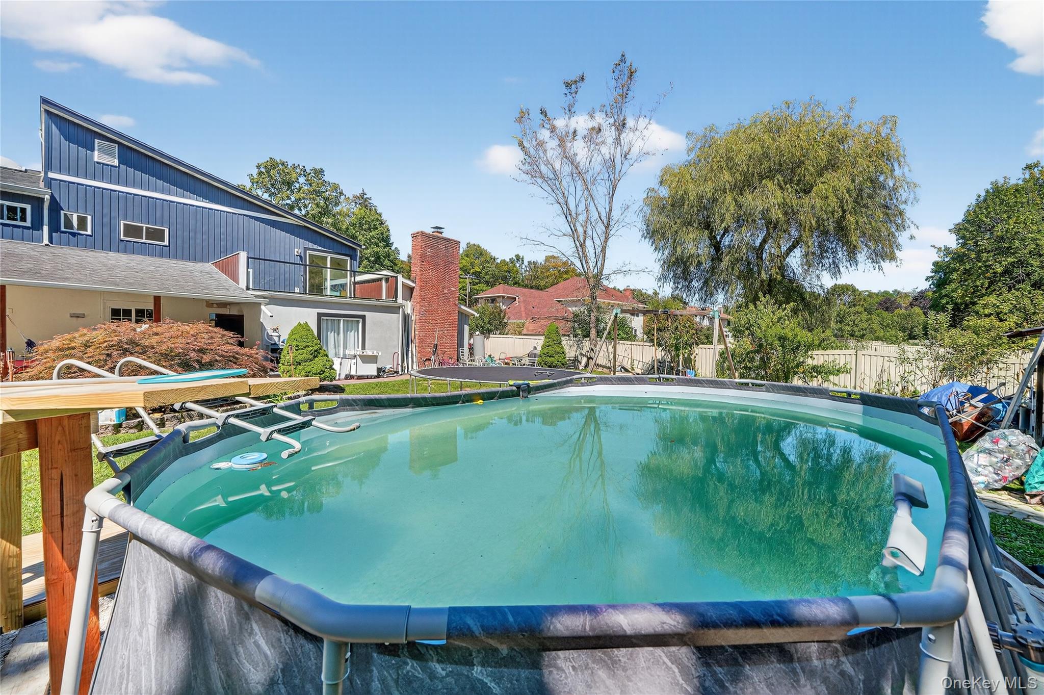 306 South Pascack Road Nanuet, NY 10954 - Photo 44 of 48 View of pool featuring a balcony and a patio