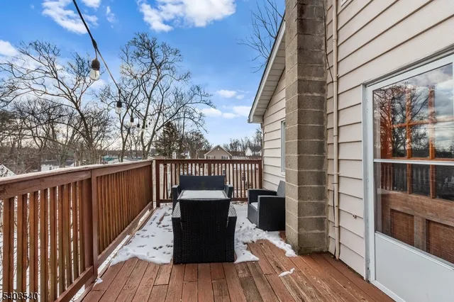a balcony with wooden floor