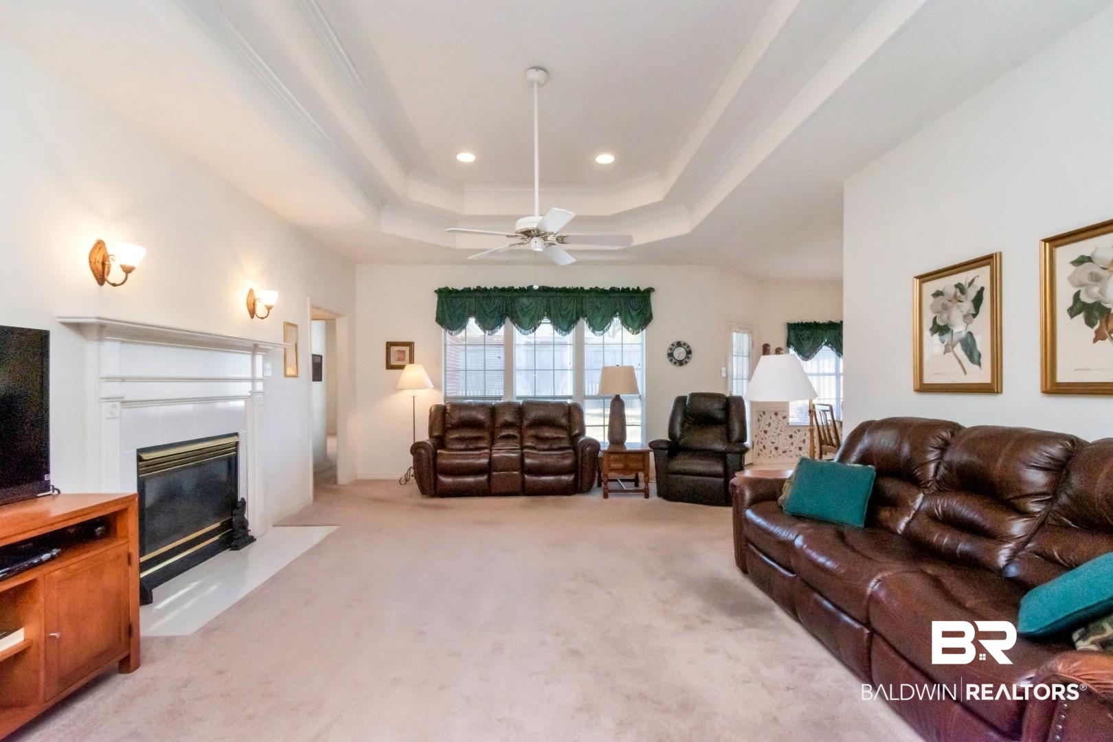 1032 Cross Gates Place Mobile, AL 36609 - Photo 7 of 34 Living area with a ceiling fan, light colored carpet, a fireplace, and recessed lighting
