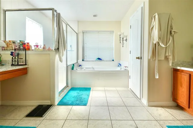 a bathroom with a bathtub sink and toilet