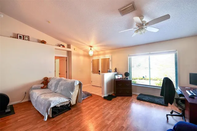 a kitchen with stainless steel appliances a sink and a refrigerator