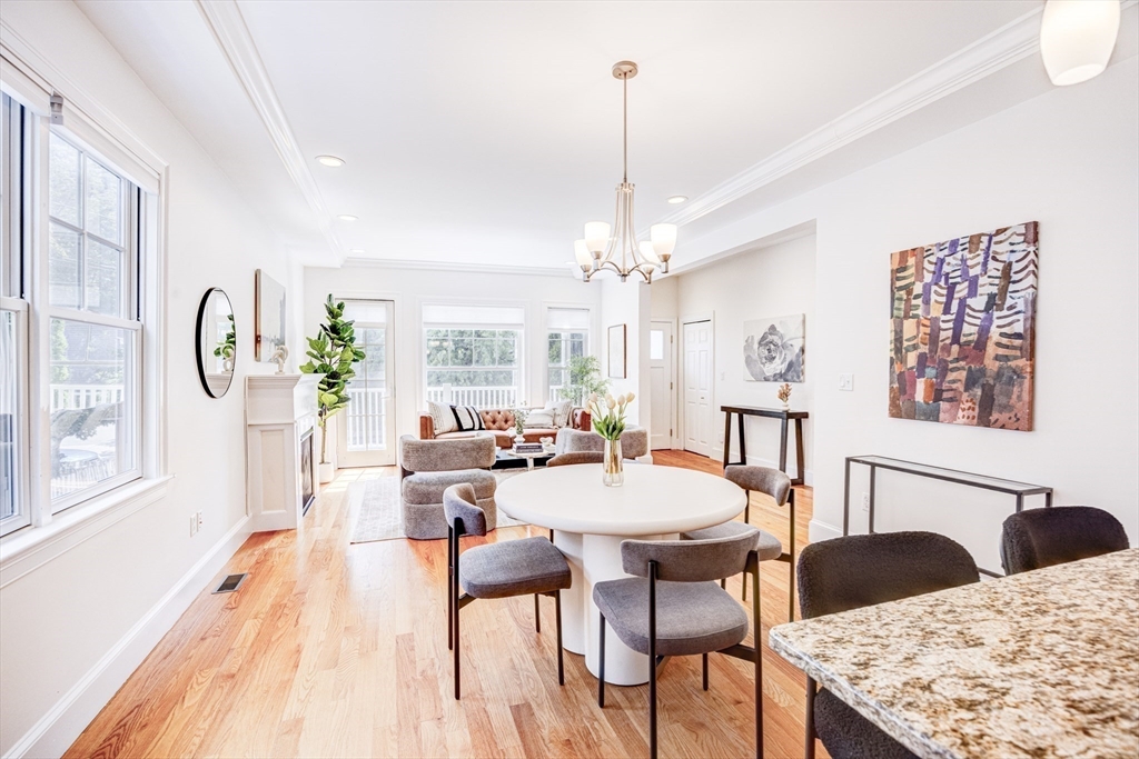 19 Harris Street, Unit 2 Brookline, MA 02446 - Photo 12 of 31 a view of a dining room with furniture window and wooden floor