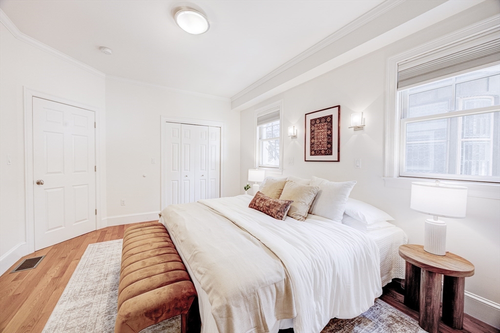 19 Harris Street, Unit 2 Brookline, MA 02446 - Photo 20 of 31 a bedroom with bed and a window