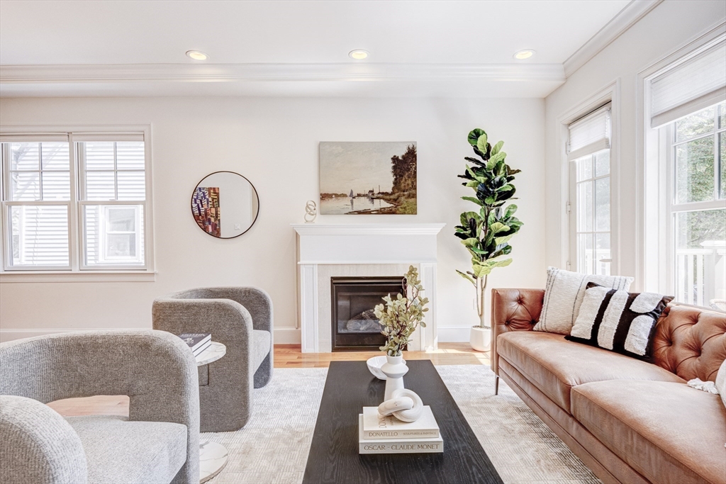19 Harris Street, Unit 2 Brookline, MA 02446 - Photo 2 of 31 a living room with furniture fireplace and window