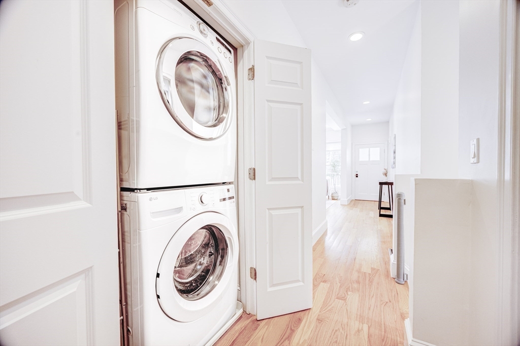 19 Harris Street, Unit 2 Brookline, MA 02446 - Photo 25 of 31 a view of a storage and utility room with washer and dryer