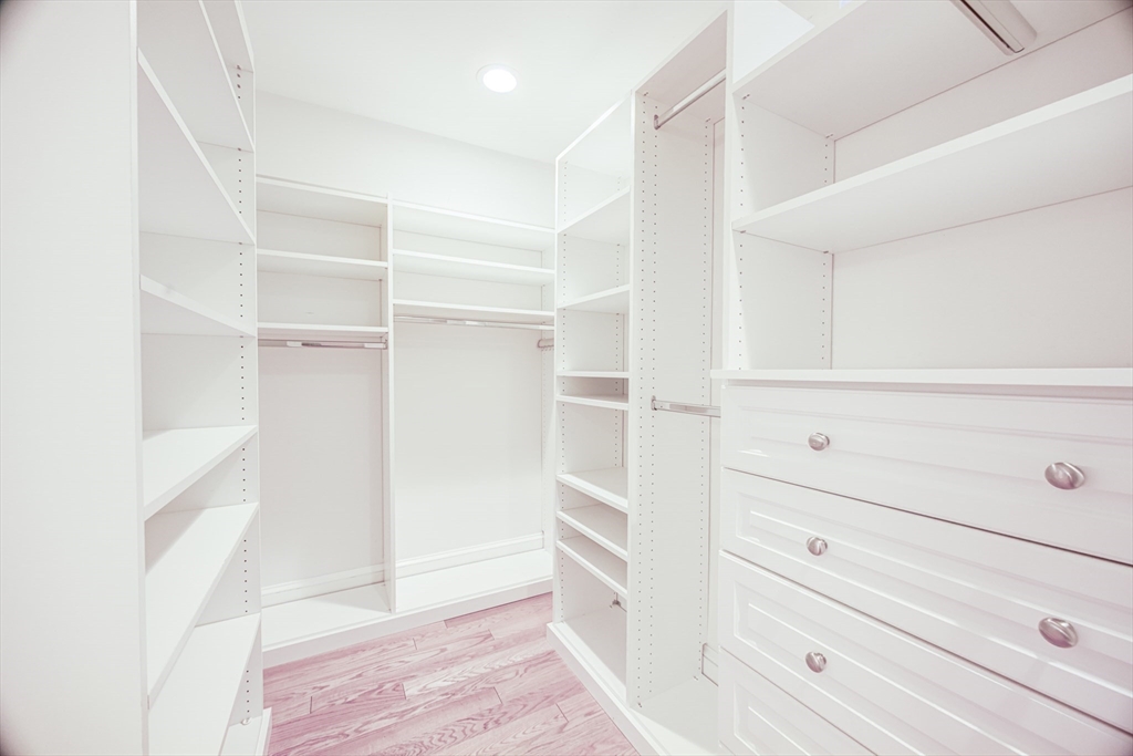 19 Harris Street, Unit 2 Brookline, MA 02446 - Photo 29 of 31 a view of walk in closet with empty racks