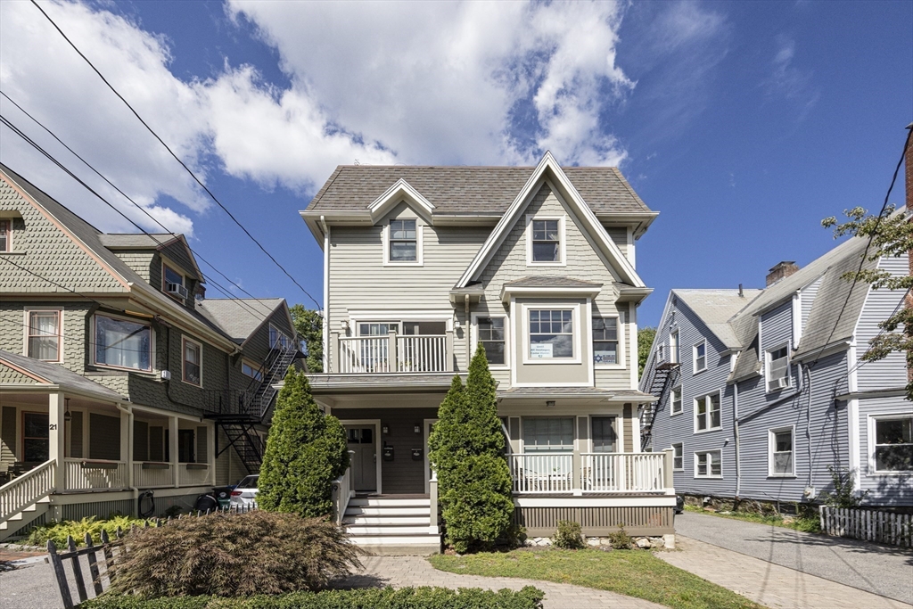 19 Harris Street, Unit 2 Brookline, MA 02446 - Photo 30 of 31 a front view of a house with a yard