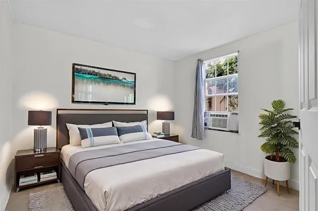 a kitchen with stainless steel appliances granite countertop a stove and a refrigerator