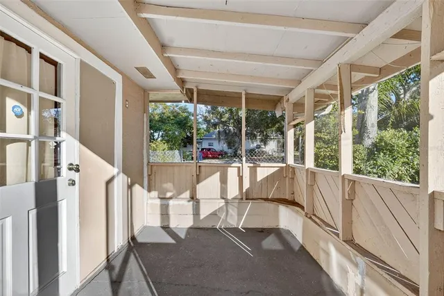 a view of balcony with furniture