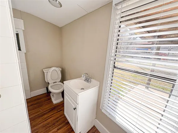 a bathroom with a sink and a toilet