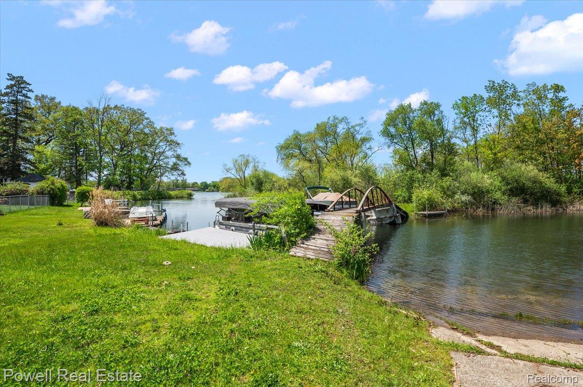 6837 Hatchery Road Waterford, MI 48327 - Photo 10 of 56 Water view featuring a dock