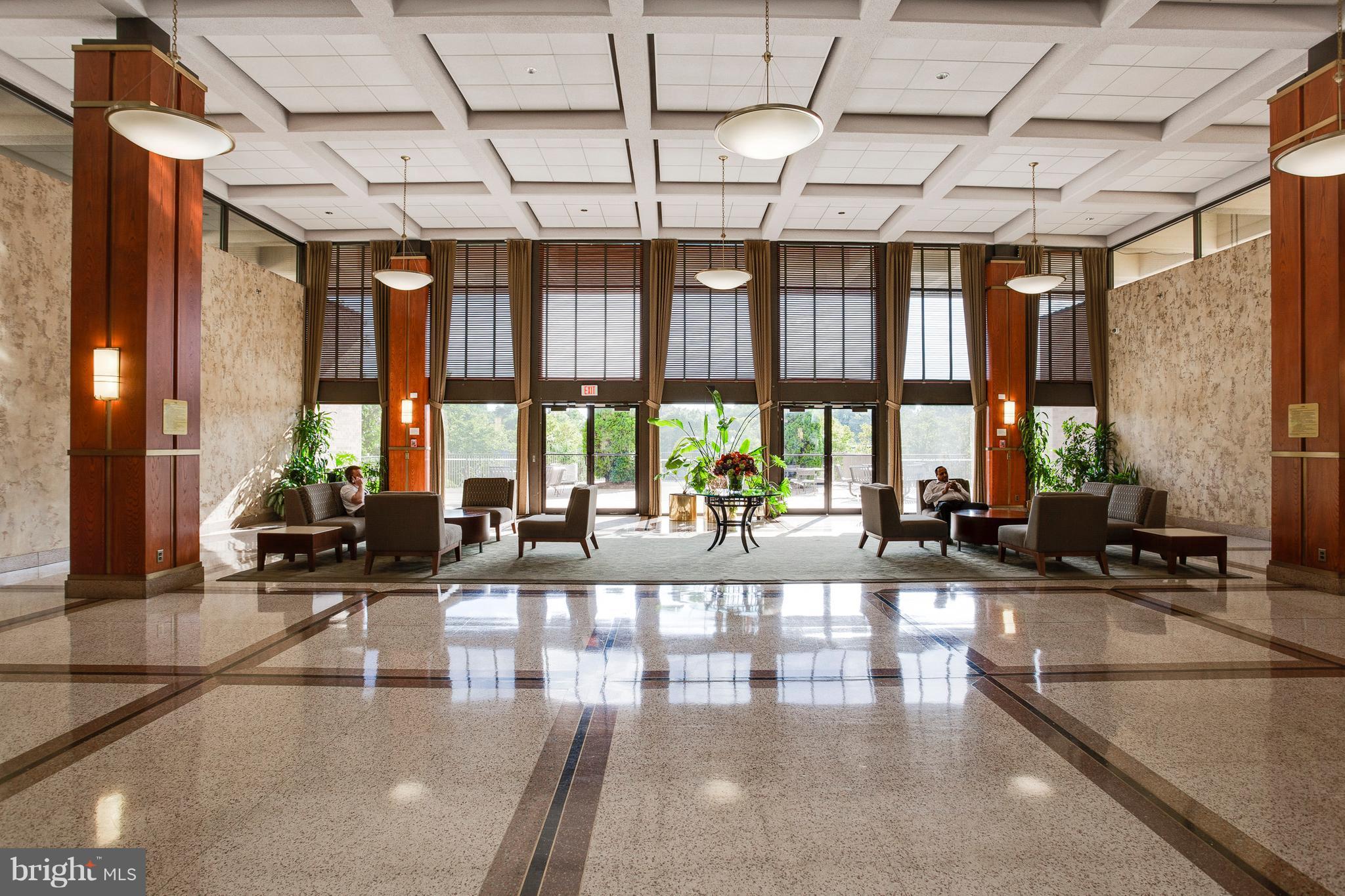5505 Seminary Road, Unit 2211N Falls Church, VA 22041 - Photo 2 of 30 a lobby with furniture and floor to ceiling window