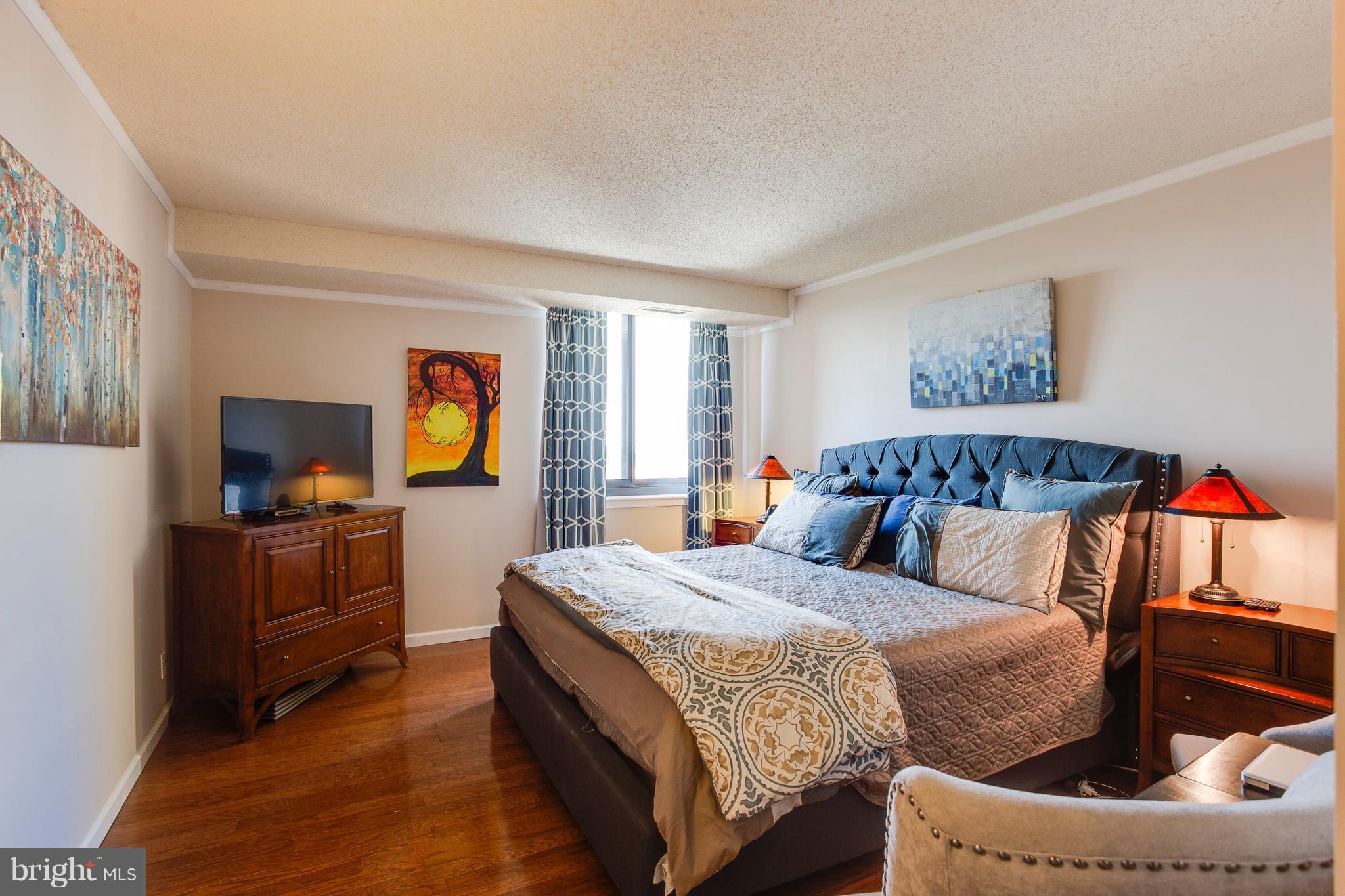 5505 Seminary Road, Unit 2211N Falls Church, VA 22041 - Photo 15 of 30 a bedroom with a bed and a television