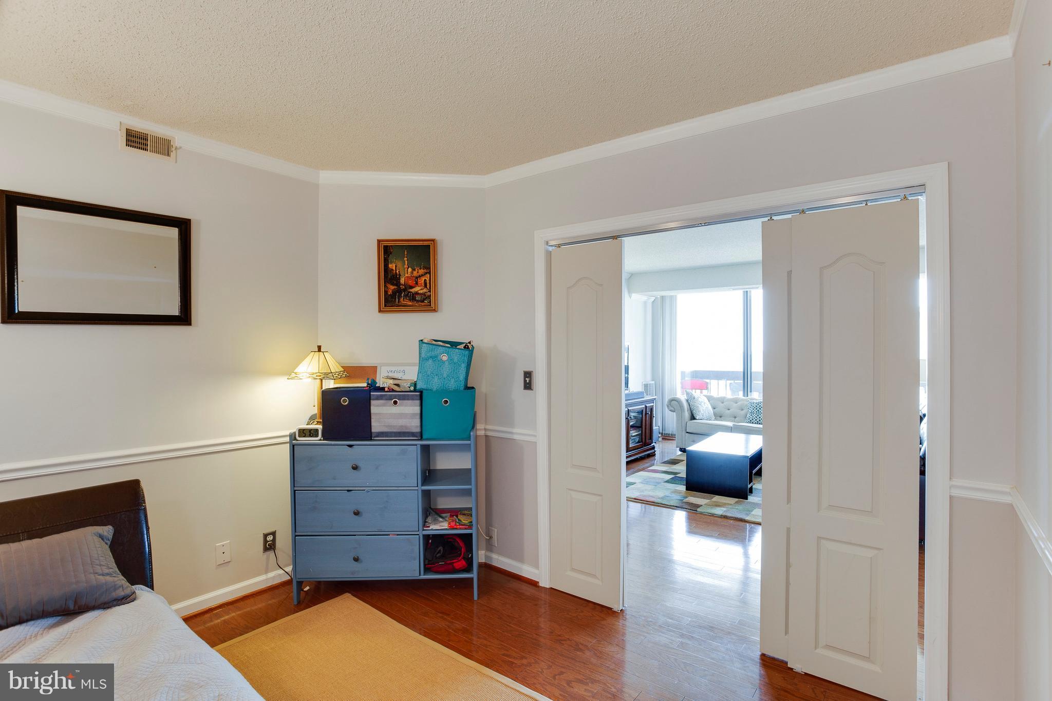 5505 Seminary Road, Unit 2211N Falls Church, VA 22041 - Photo 19 of 30 a view of a bedroom with a bed and furniture