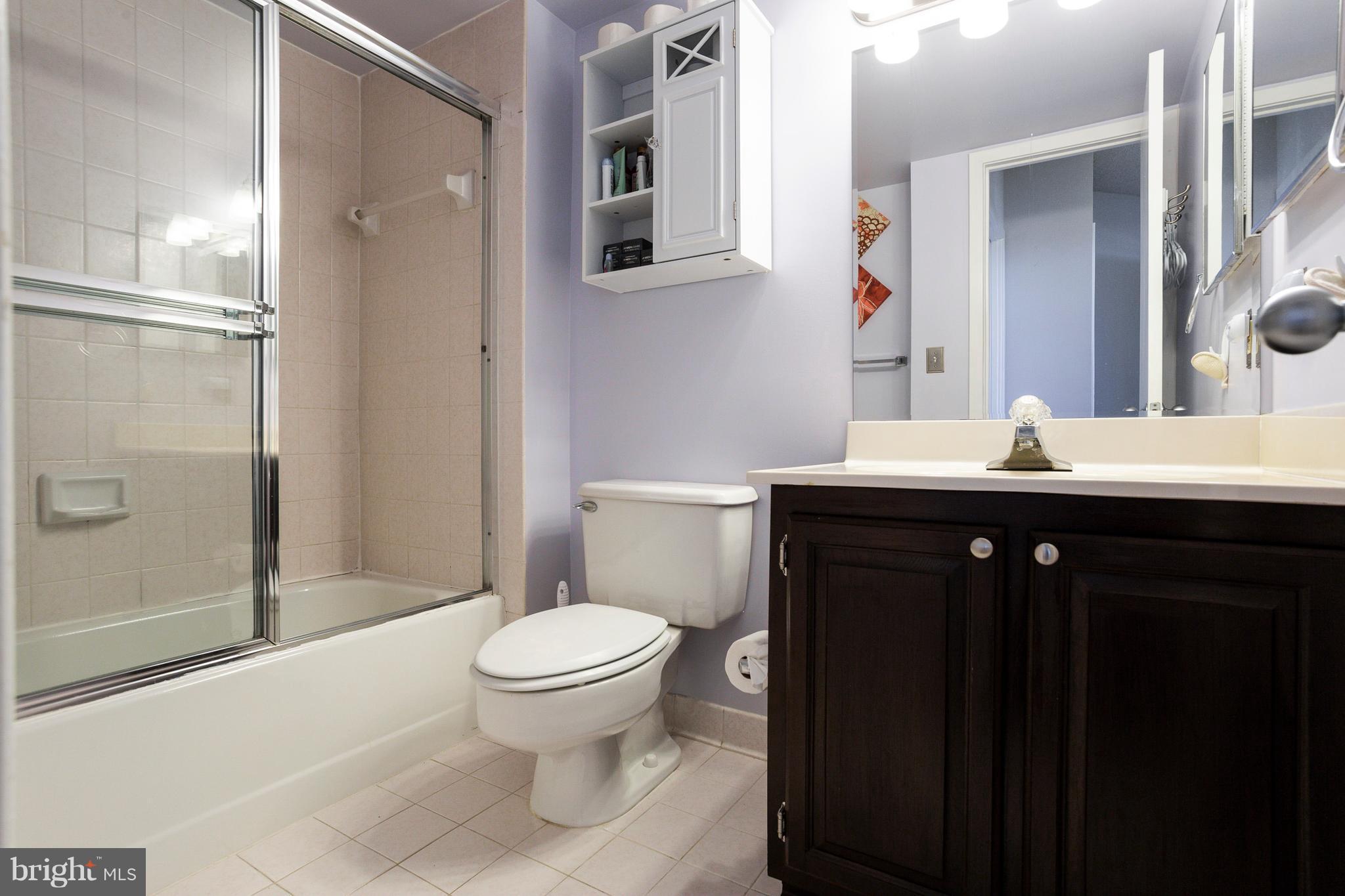 5505 Seminary Road, Unit 2211N Falls Church, VA 22041 - Photo 20 of 30 a bathroom with a sink toilet and shower