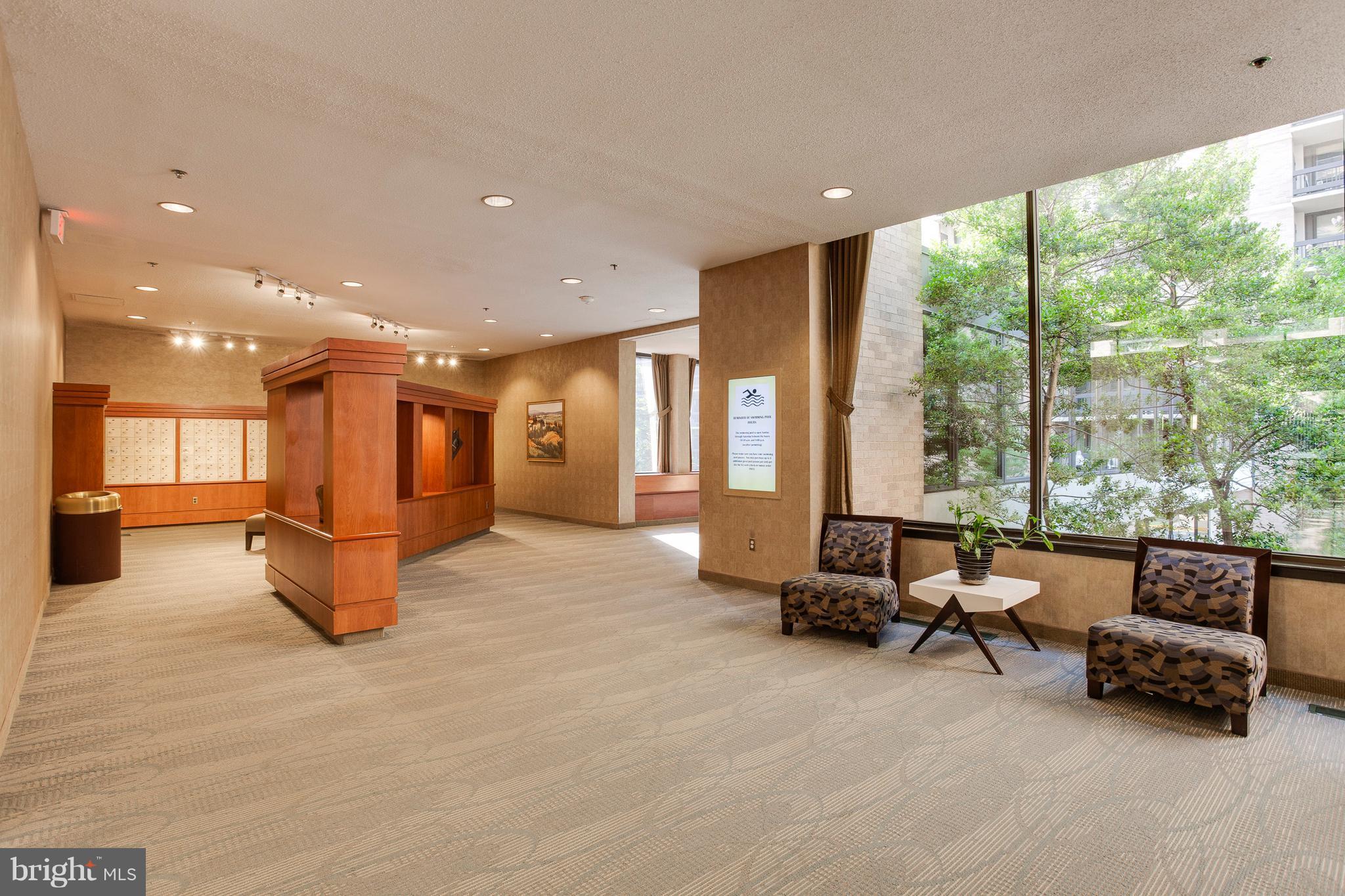 5505 Seminary Road, Unit 2211N Falls Church, VA 22041 - Photo 5 of 30 a lobby with furniture and floor to ceiling window