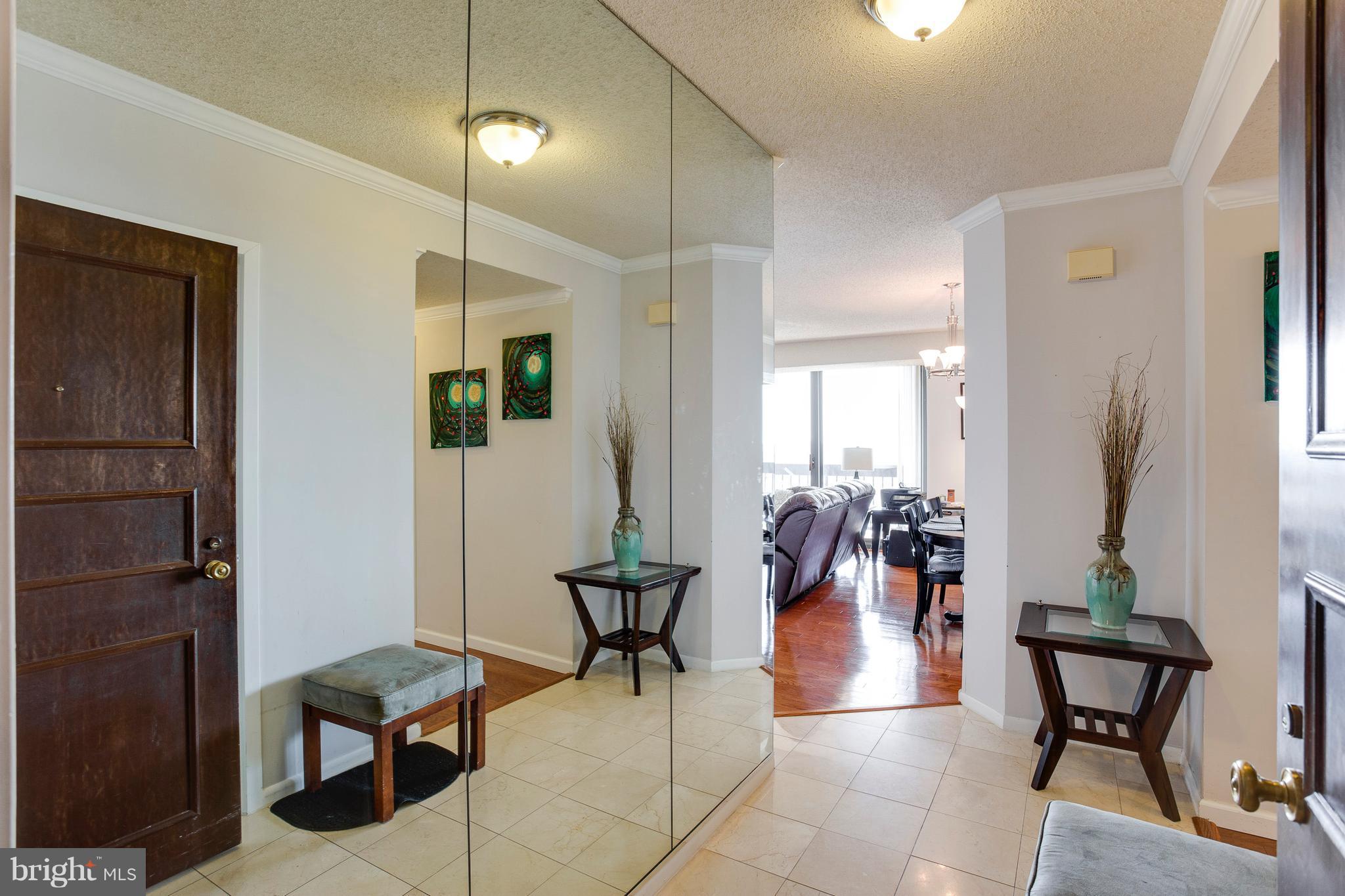 5505 Seminary Road, Unit 2211N Falls Church, VA 22041 - Photo 6 of 30 a lobby with furniture and wooden floor