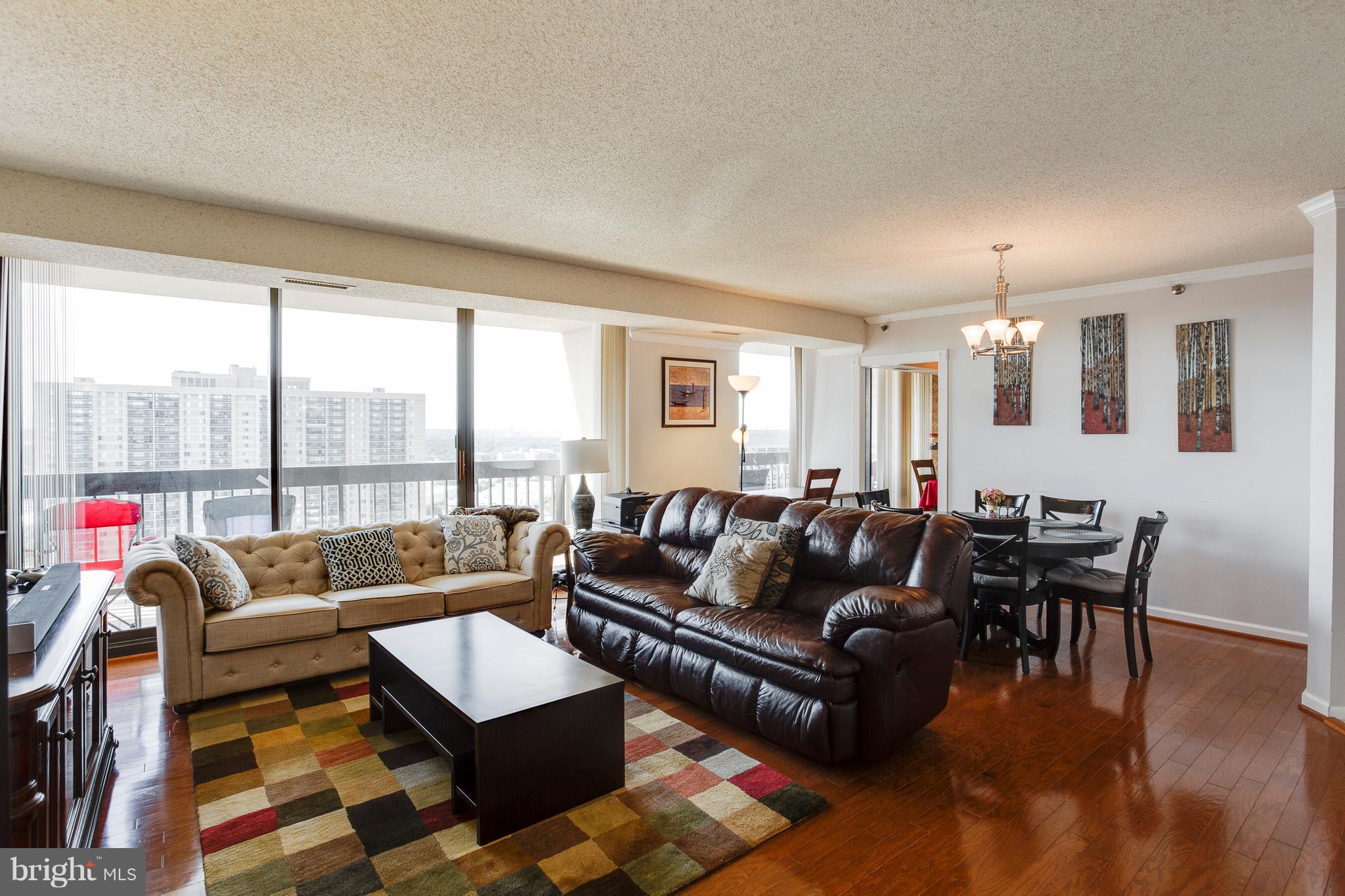 5505 Seminary Road, Unit 2211N Falls Church, VA 22041 - Photo 7 of 30 a living room with furniture and a large window