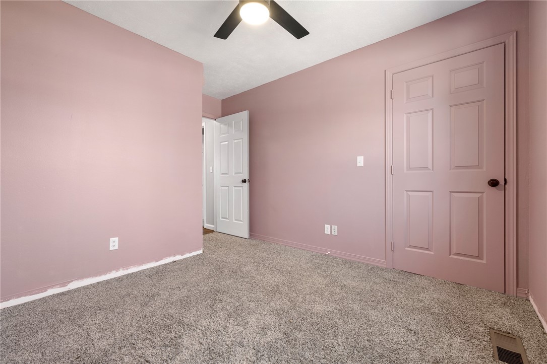10974 Ricks Drive Harrison, AR 72601 - Photo 32 of 59 Unfurnished bedroom featuring carpet flooring and ceiling fan