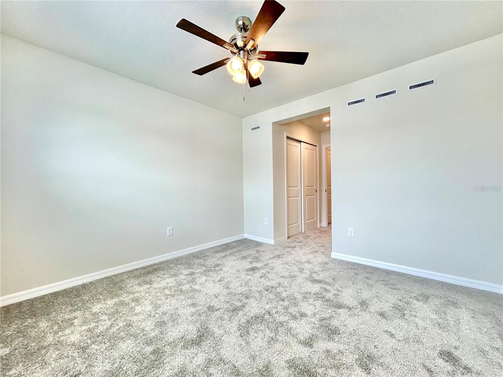 4652 Sparkling Shell Avenue Kissimmee, FL 34746 - Photo 13 of 35 a view of an empty room
