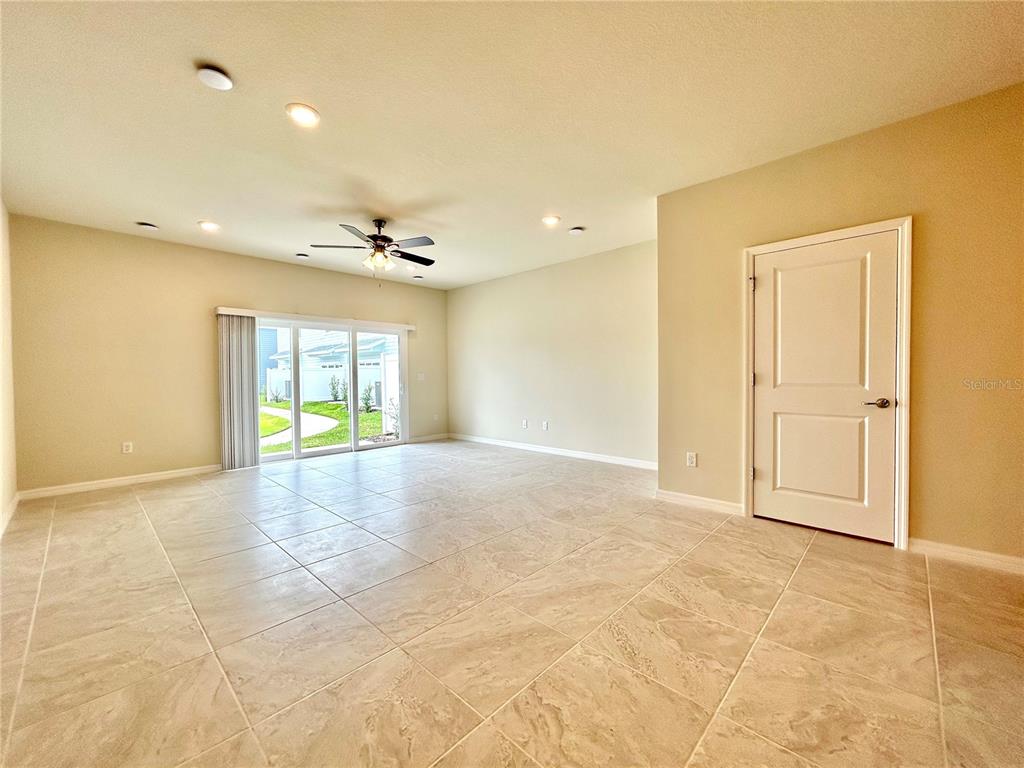4652 Sparkling Shell Avenue Kissimmee, FL 34746 - Photo 8 of 35 a view of an empty room