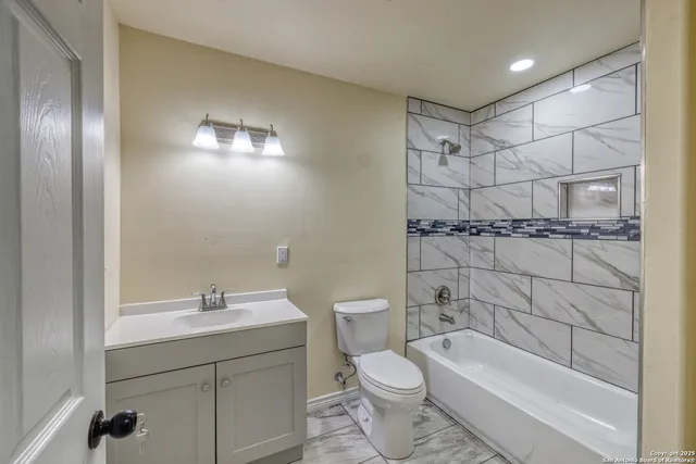 a view of a door and an entryway in a room