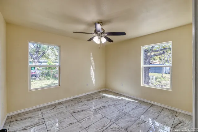 a backyard of a house with lots of green space