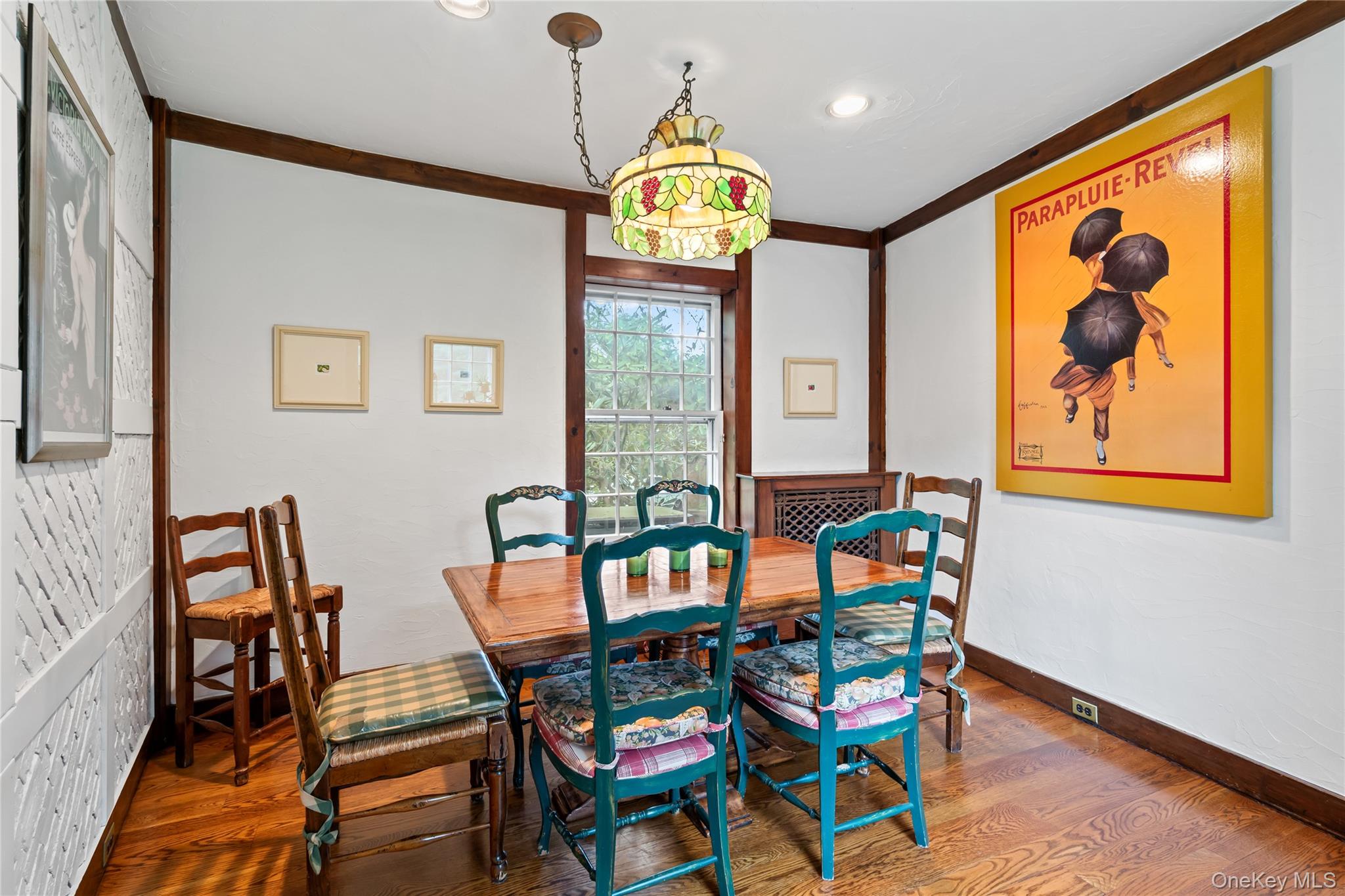 88 Wheatley Road Old Westbury, NY 11568 - Photo 20 of 40 Dining space featuring wood finished floors, crown molding, and recessed lighting