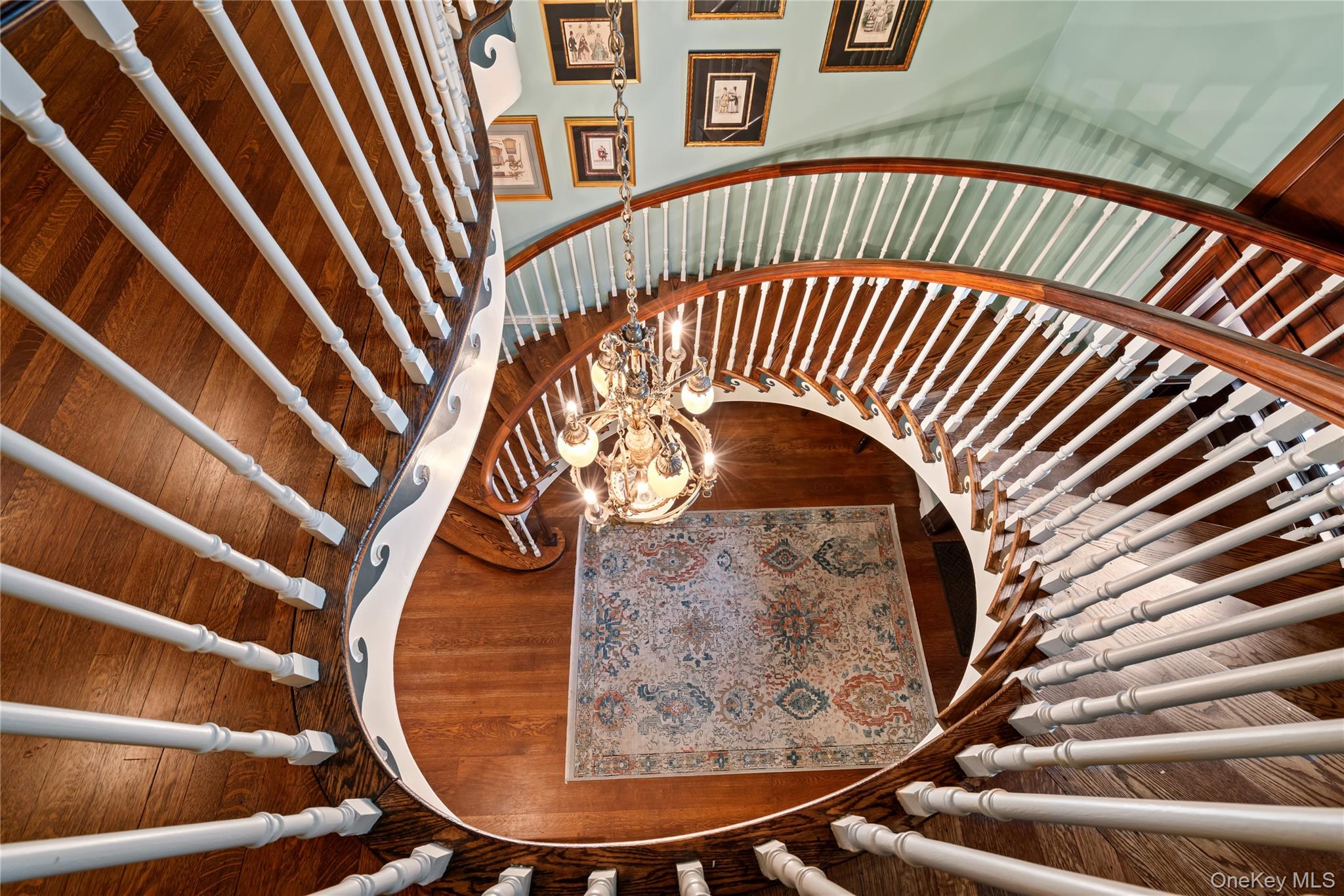 88 Wheatley Road Old Westbury, NY 11568 - Photo 22 of 40 Stairs with wood finished floors