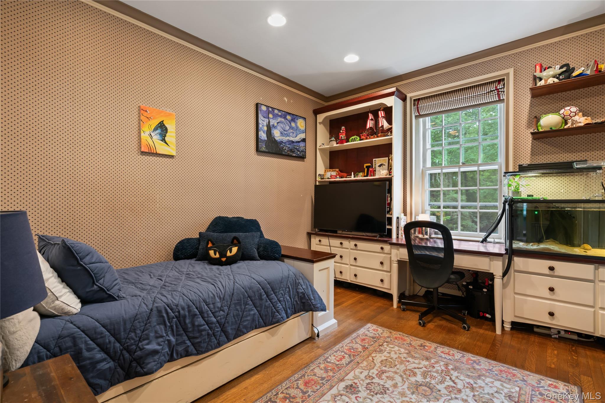 88 Wheatley Road Old Westbury, NY 11568 - Photo 29 of 40 Bedroom featuring dark wood-style floors, recessed lighting, crown molding, and an office area