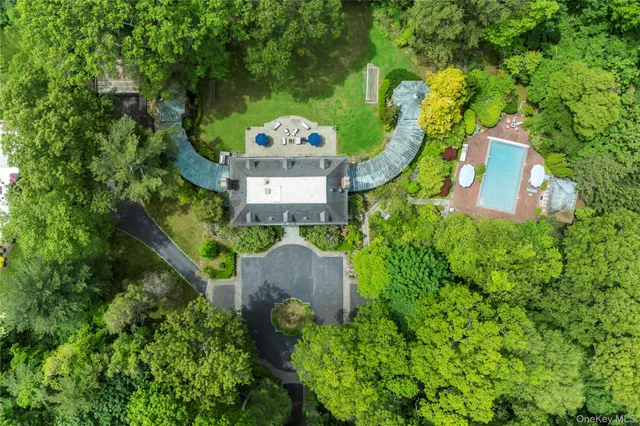 an aerial view of a house with a garden