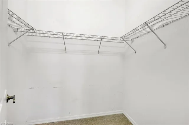 a view of a room with racks on the wall
