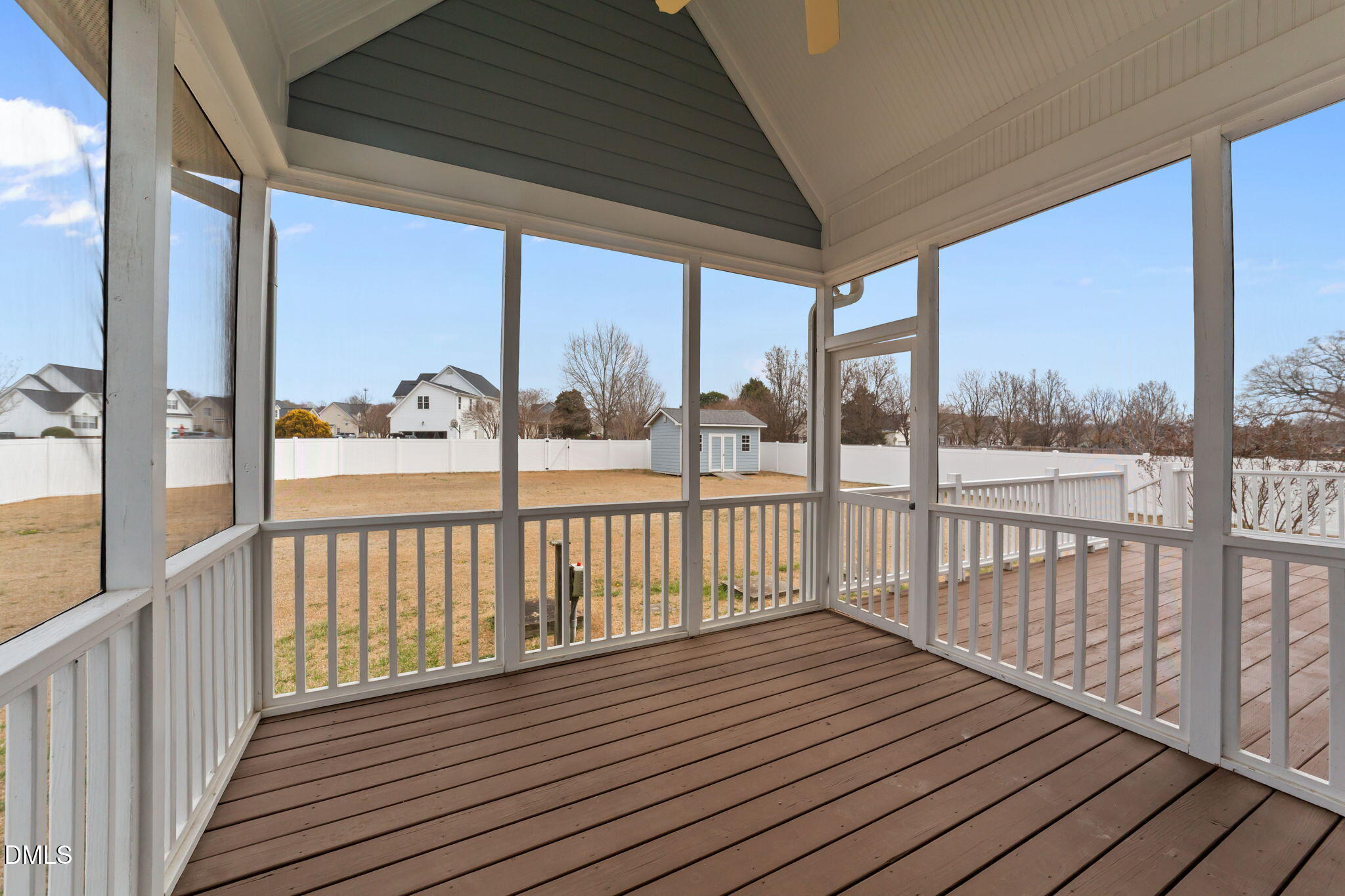7101 Numa Circle Willow Spring, NC 27592 - Photo 26 of 44 a view of a balcony with wooden floor