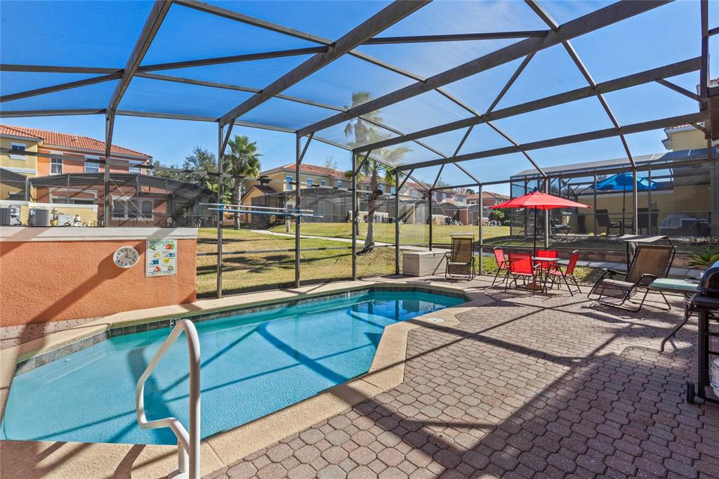8535 Bay Lilly Loop Kissimmee, FL 34747 - Photo 2 of 57 a view of swimming pool with a patio