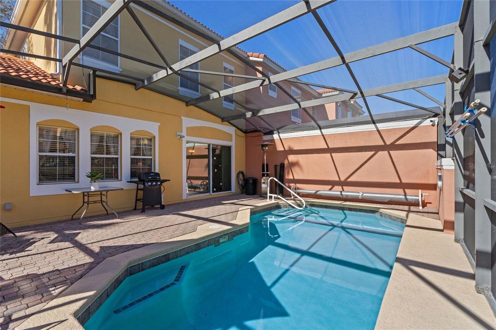 8535 Bay Lilly Loop Kissimmee, FL 34747 - Photo 26 of 57 a view of a backyard with sitting area
