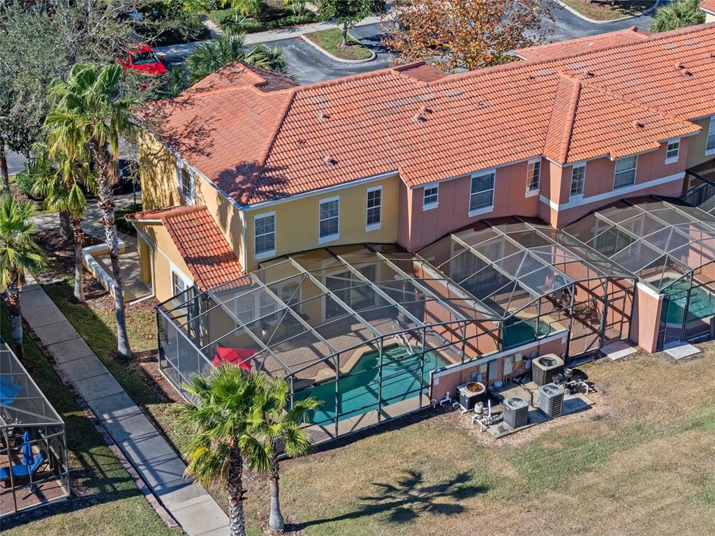 8535 Bay Lilly Loop Kissimmee, FL 34747 - Photo 33 of 57 an aerial view of a house with a yard and sitting area