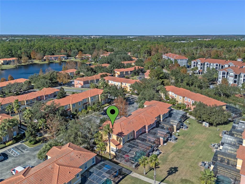 8535 Bay Lilly Loop Kissimmee, FL 34747 - Photo 36 of 57 an aerial view of residential houses with outdoor space and river