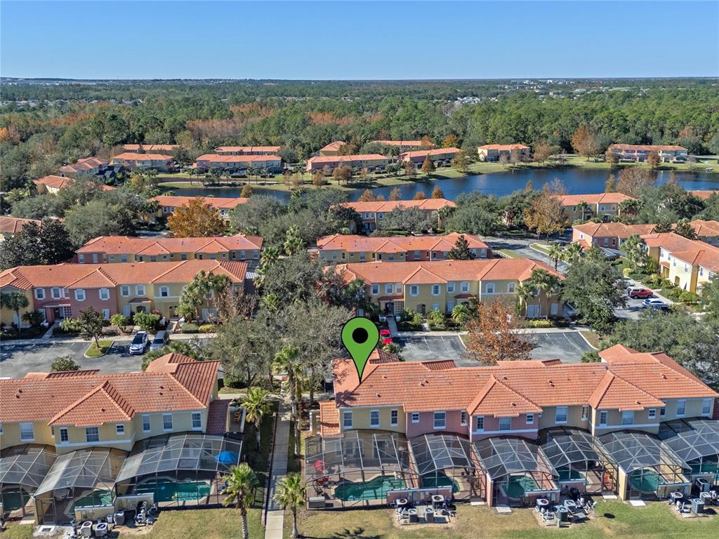 8535 Bay Lilly Loop Kissimmee, FL 34747 - Photo 37 of 57 an aerial view of residential houses and lake
