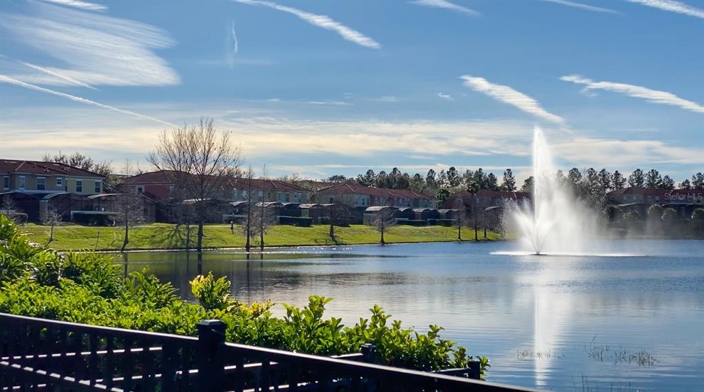 8535 Bay Lilly Loop Kissimmee, FL 34747 - Photo 44 of 57 a view of a swimming pool and outdoor seating