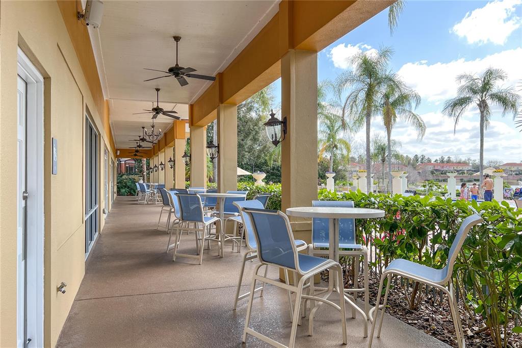 8535 Bay Lilly Loop Kissimmee, FL 34747 - Photo 56 of 57 a view of a dining room with furniture window and outside view