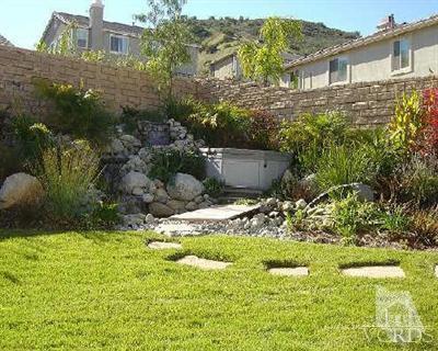 1497 Hidden Ranch Drive Simi Valley, CA 93063 - Photo 7 of 9 a view of a back yard of the house