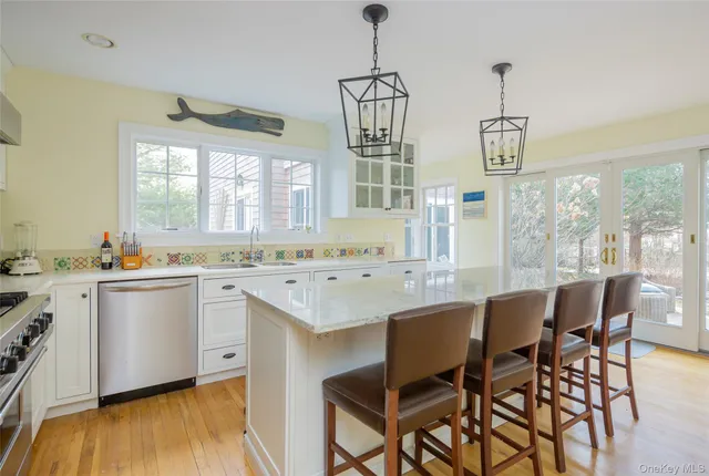 a dining room with furniture window wooden floor