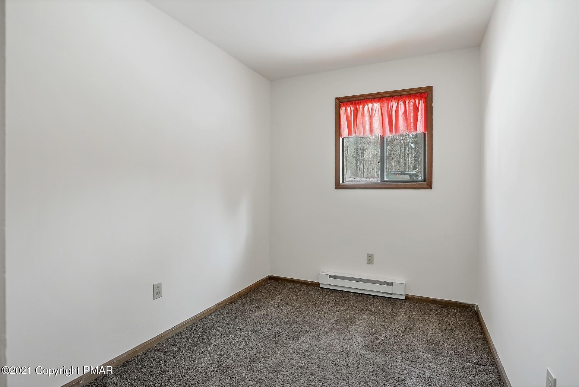 1908 Johns Road Effort, PA 18330 - Photo 11 of 23 an empty room with windows