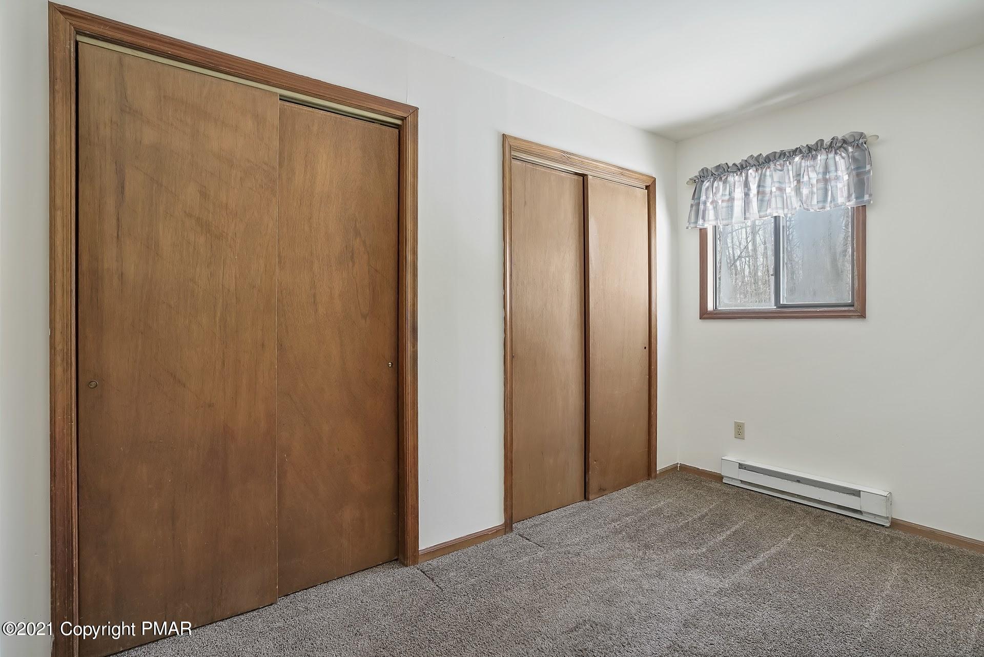 1908 Johns Road Effort, PA 18330 - Photo 13 of 23 a view of an empty room with closet and a window