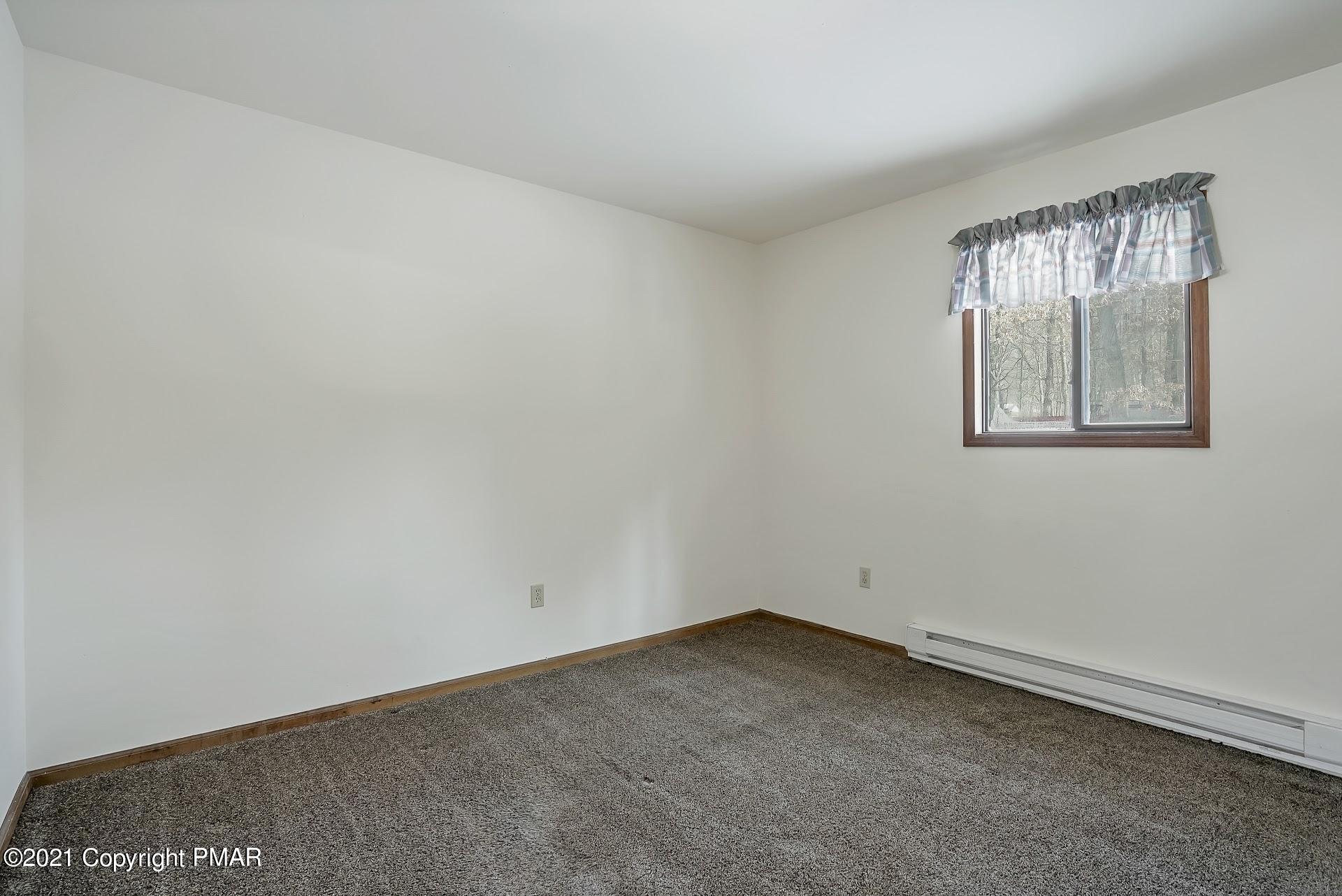 1908 Johns Road Effort, PA 18330 - Photo 14 of 23 an empty room with windows