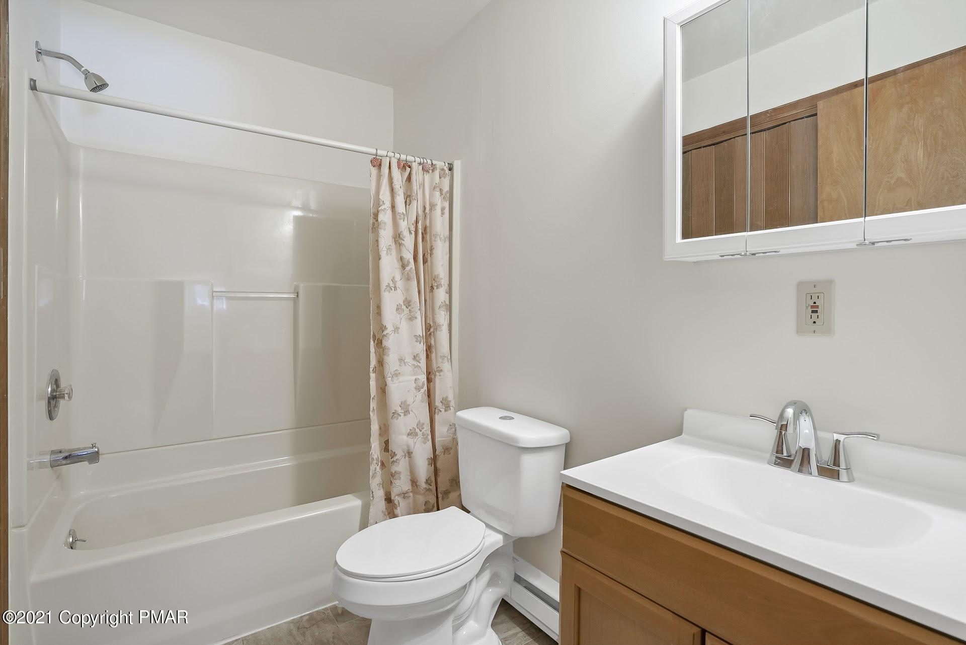 1908 Johns Road Effort, PA 18330 - Photo 16 of 23 a bathroom with a sink toilet and shower